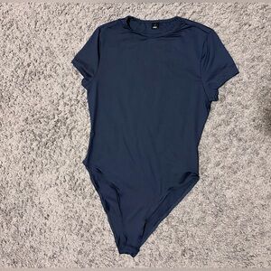 NEVER WORN BRAND NEW Navy Blue Women's one piece.